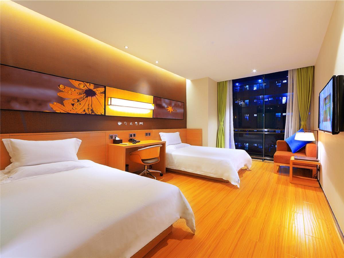 Iu Hotel Zhanjiang Haibin Avenue Xinhaimingchen Екстериор снимка